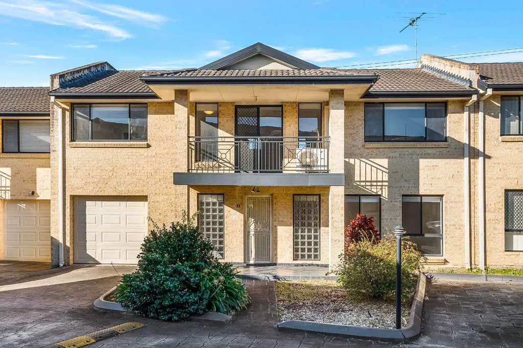Freshly Refreshed Family Townhouse with Multiple Living Areas!