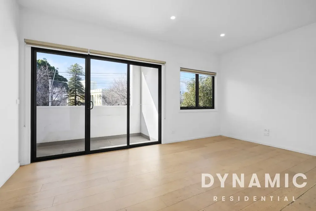 Modern Two-Bedroom Townhouse with Private Front Yard in Prime Location!