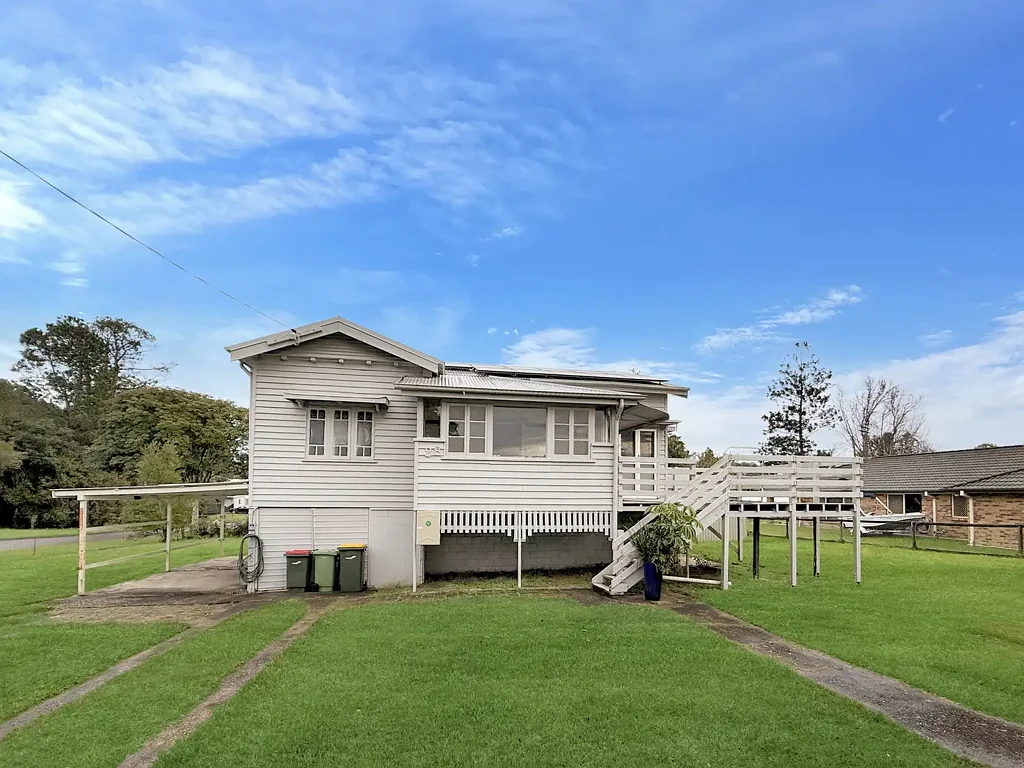 Charming Queenslander with Spacious Yard & Flexible Living
