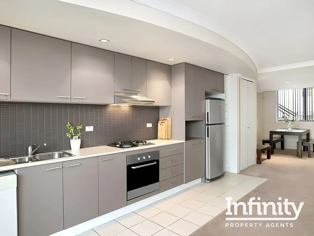 IMMACULATE SPLIT LEVEL PENTHOUSE STYLE APARTMENT WITH STUDY