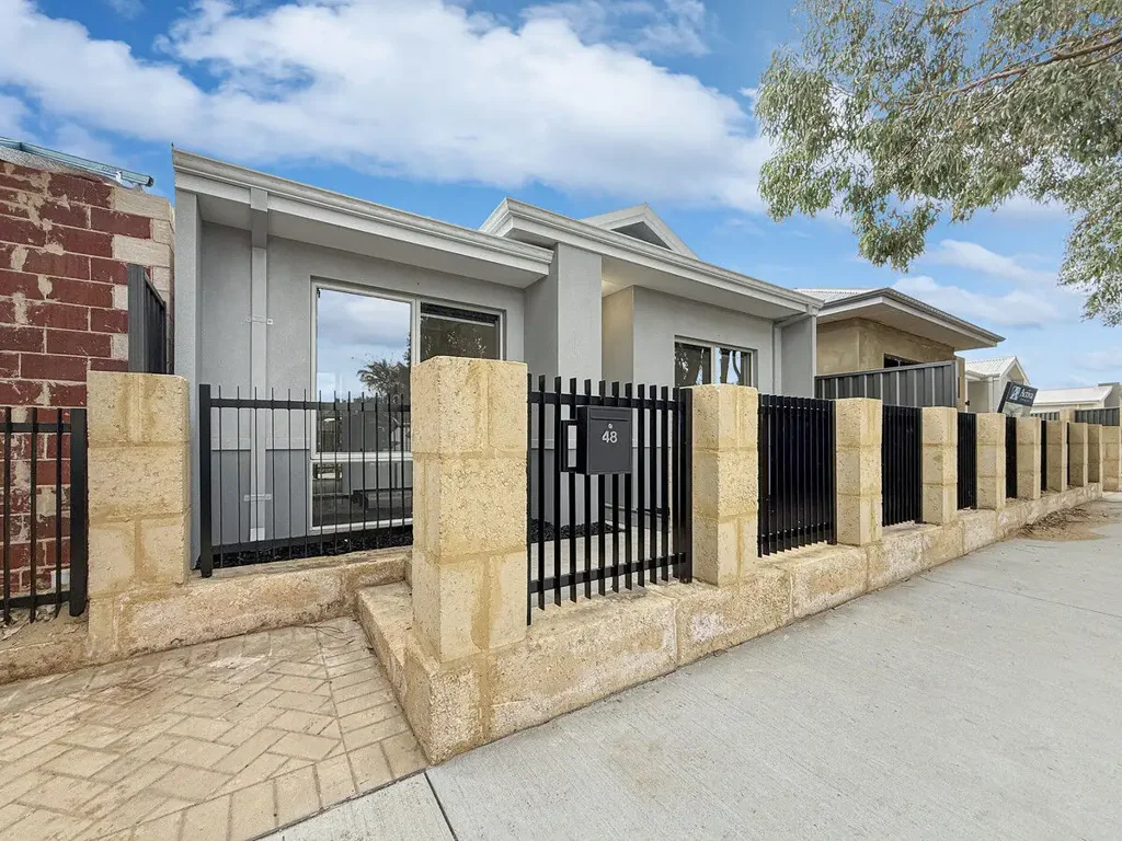 Brand New, Low Maintenance Living in a Convenient Location!