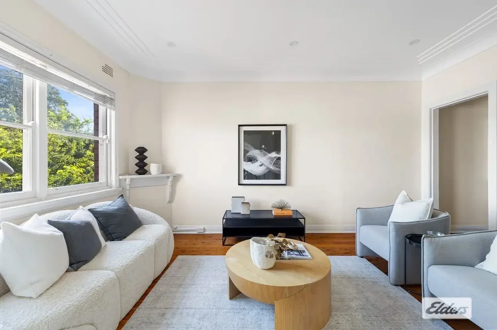 TOP FLOOR NORTH FACING APARTMENT WITH HARBOUR BRIDGE VIEWS