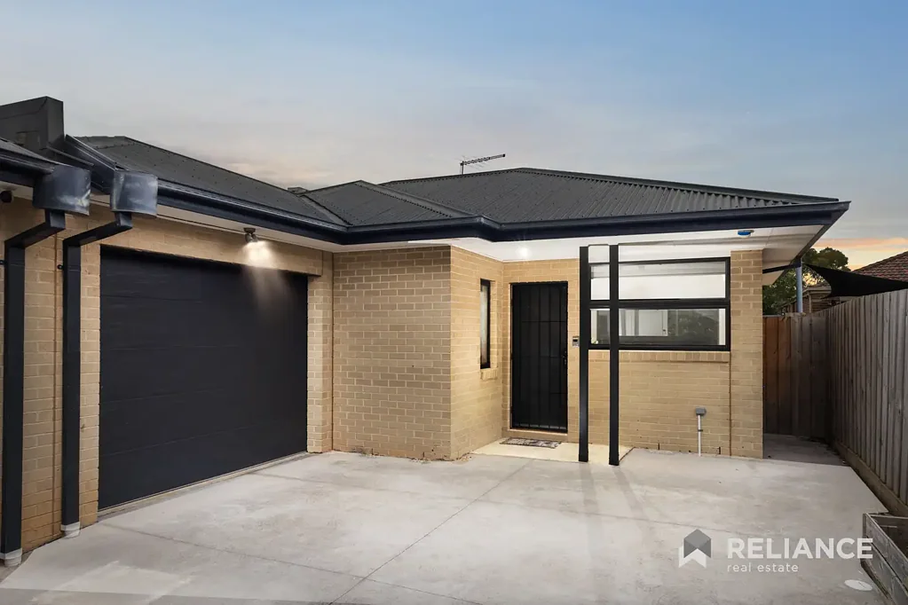 Stylish Modern Unit with Premium Finishes & Private Backyard