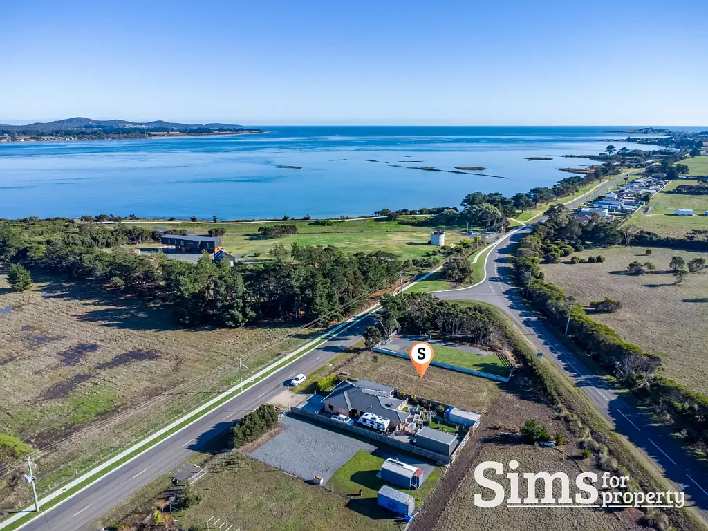 George Town Level, Well-Located, and Loaded with Potential!
