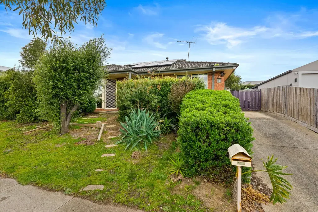 Cute as a button with a good-sized rear yard!