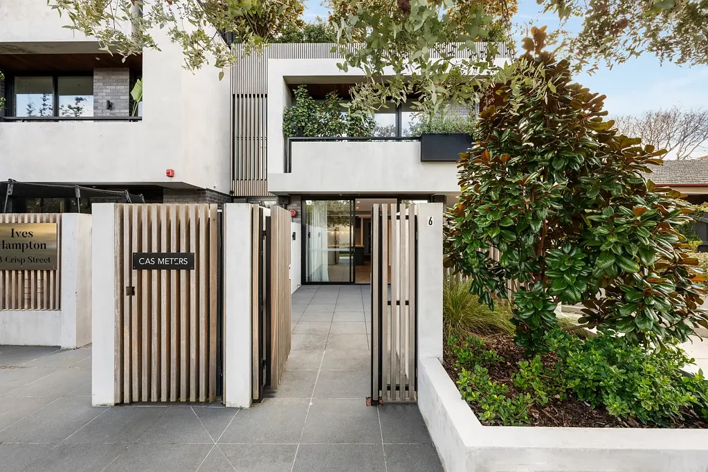 Experience the Best of Bayside Living with Dual Private Courtyards