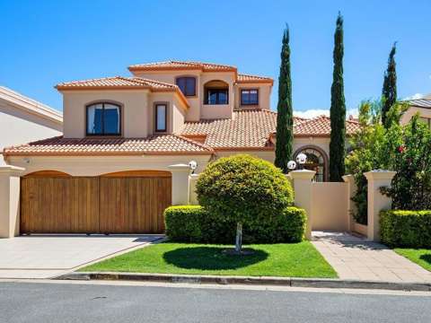French Provincial Admiralty Drive Riverfront Luxury Home