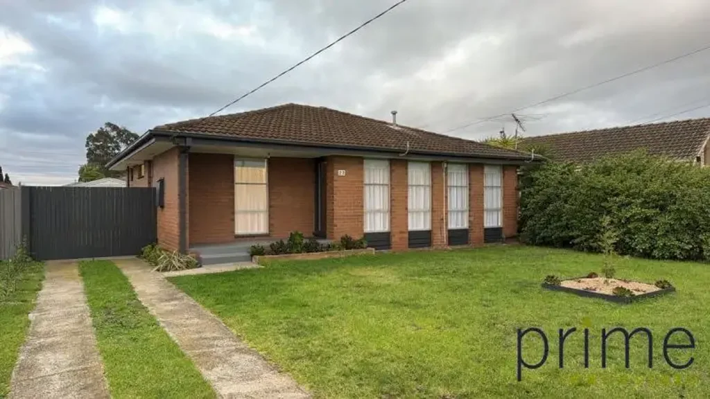 Freshly Updated Home with Secure Yard, Garage & Shed!