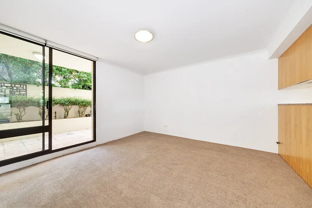 Unfurnished  split-level one bedroom apartment with 2 x courtyards and secure parking