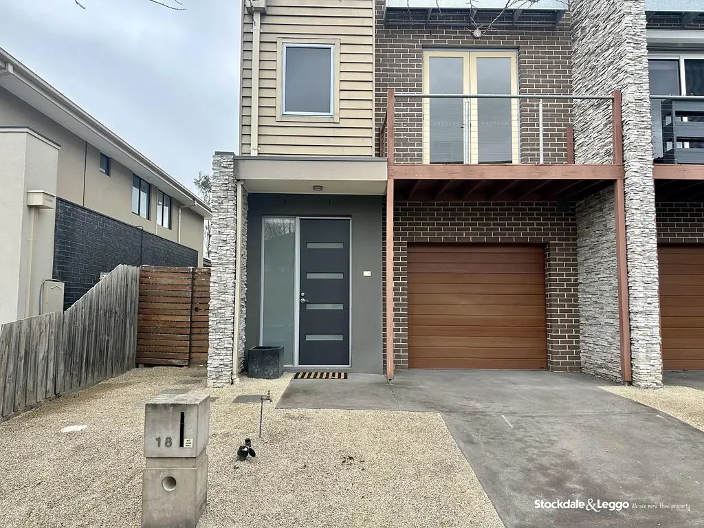 FRESHLY PAINTED & CARPETED, TWO-STORY TOWNHOUSE