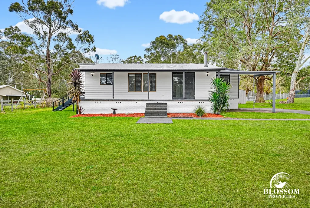 Modern Country Living on Expansive Acreage - Peaceful & Convenient