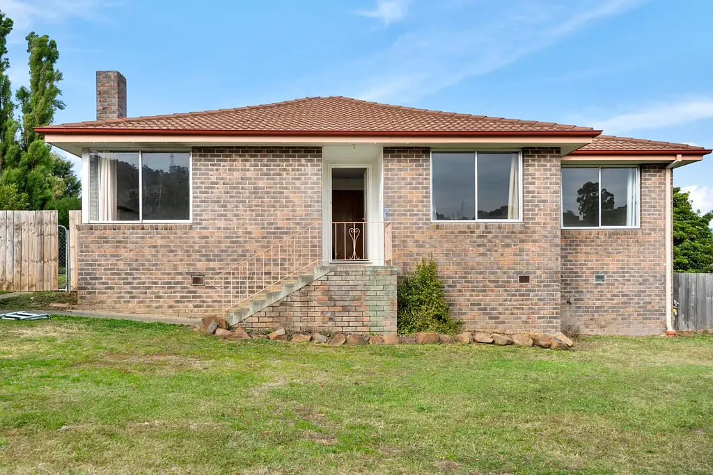 Spacious Three-Bedroom Home with Generous Fenced Yard