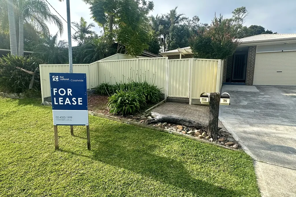 MODERN TWO-BEDROOM DUPLEX WITH PRIVATE YARD
