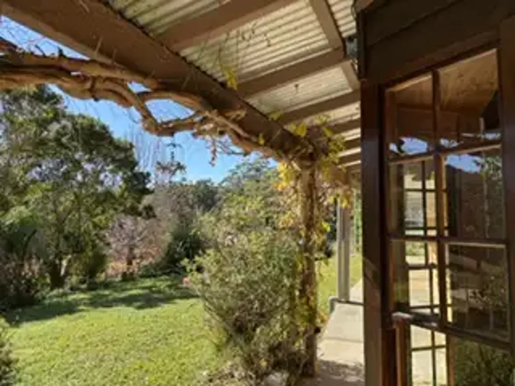 UNIQUE HOME ON ACRES WITH INGROUND POOL!