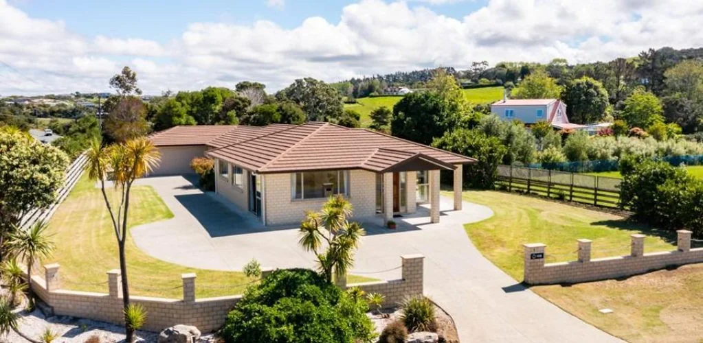 Single level family living with exceptional garage space