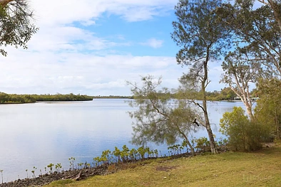 Coombabah 4 Bedroom Waterfront Living with Endless Potential in One of Coombabah’s Most Sought-After Locations