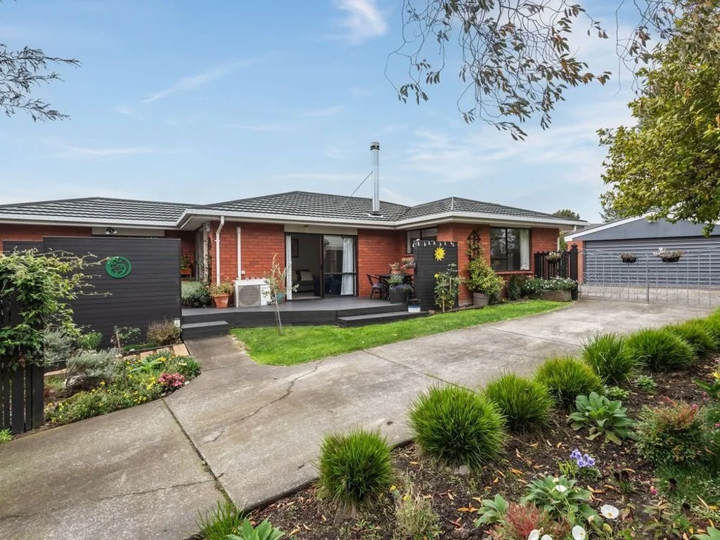 Three Bedroom Home With Established Grounds!