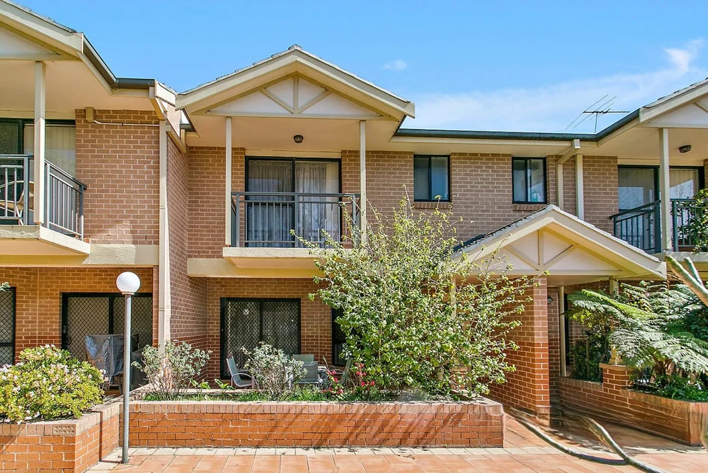 Three Bedroom Two Bathroom Modern Full Brick Townhouse in Prime Location!
