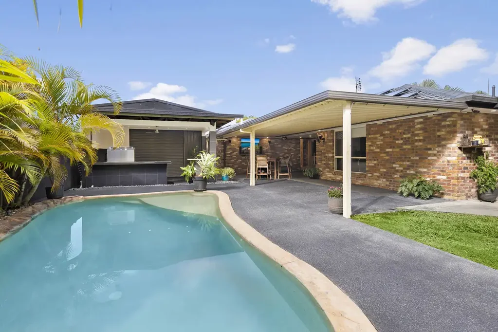 Spacious Family Home with Pool, Multiple Sheds & Huge Side Access