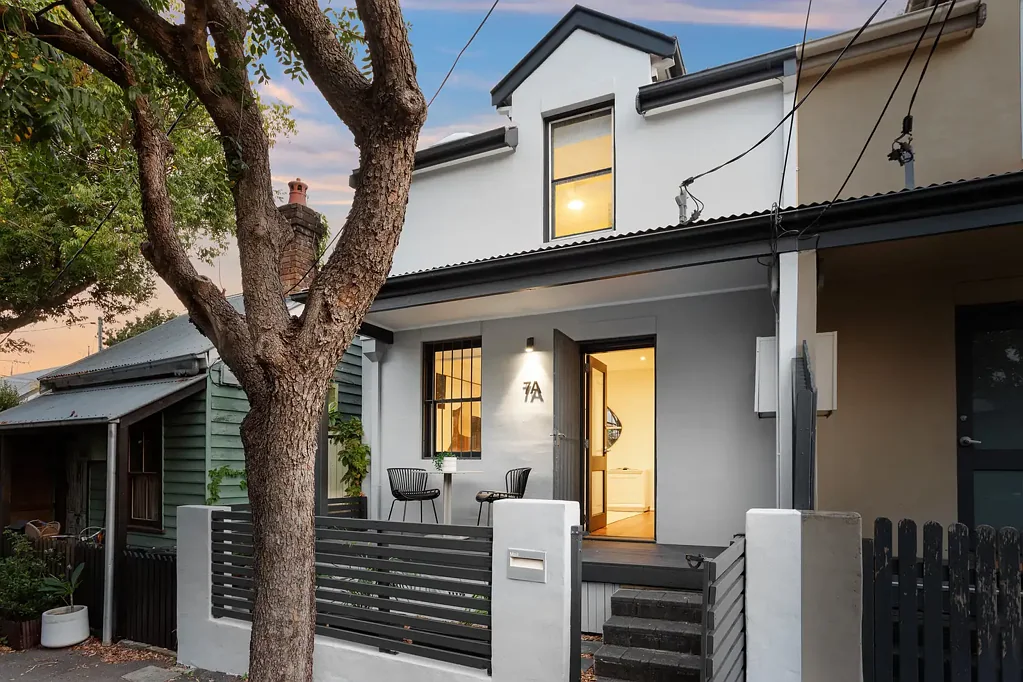 Erskineville 3 Bedroom Contemporary entertainer's haven, showcasing a generously proportioned dining area with seamless indoor-outdoor flow to the courtyard