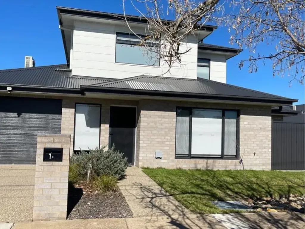 Modern, Low Maintenance Four Bedroom Home!