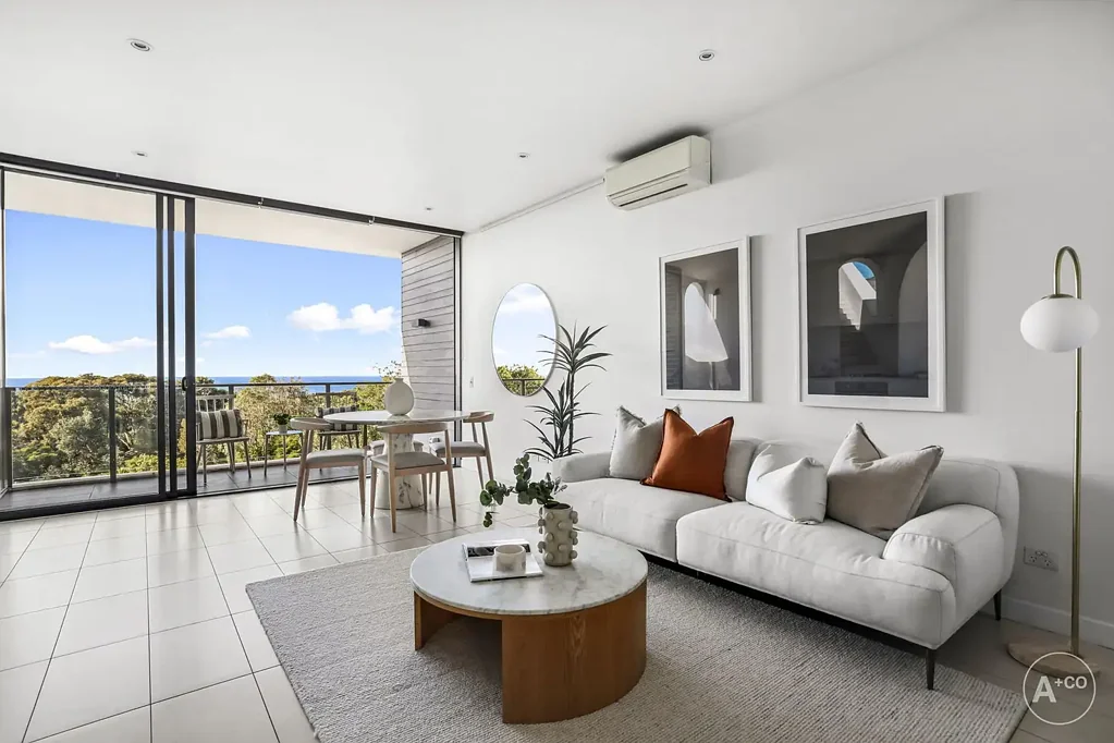 Top Floor East-Facing Apartment With Water & Golf Course Views