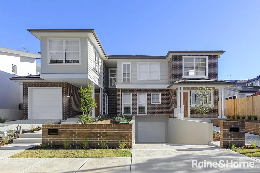 Architecturally Designed Duplex with basement parking & storage