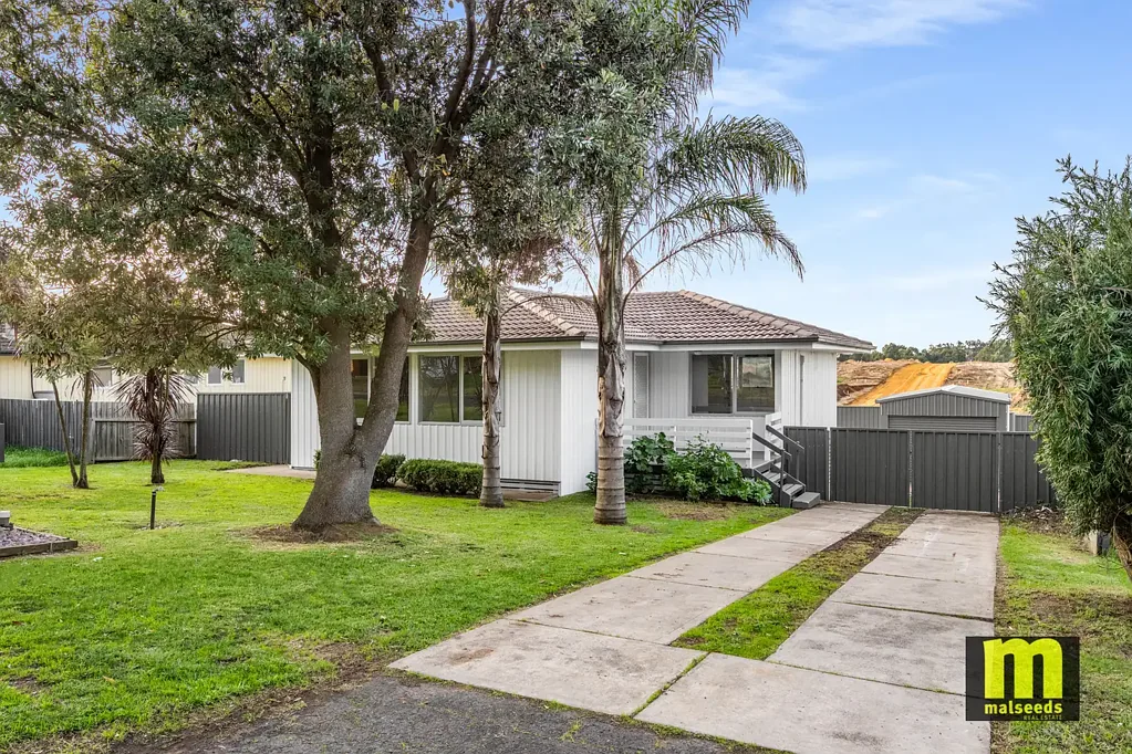 Family-Friendly Home with Secure Yard & Garage