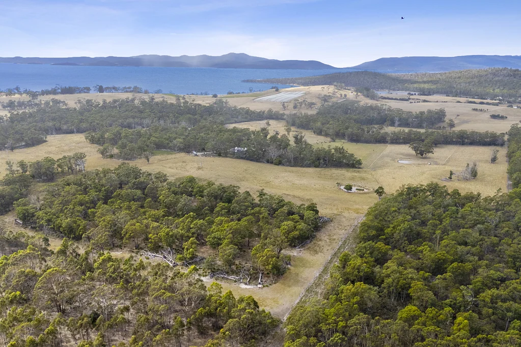 Saltwater River Serene 100+ Acre Off-Grid Farm with Two Titles & Endless Potential
