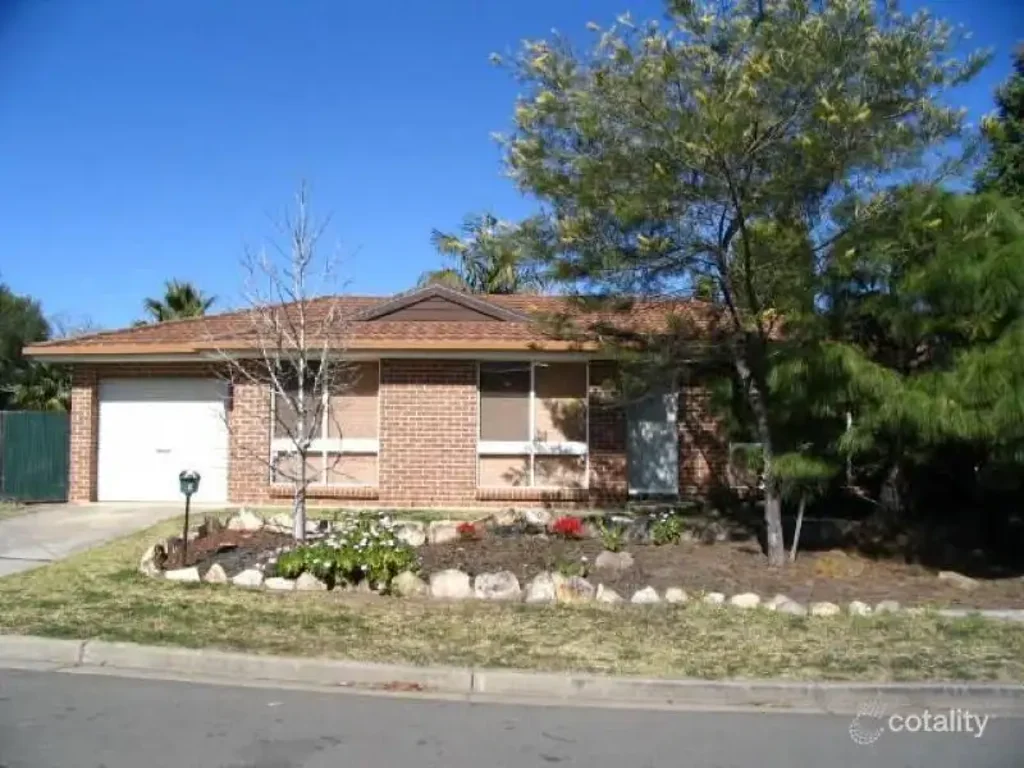 QUALITY BRICK VENEER HOME WITH AIR CONDITIONER