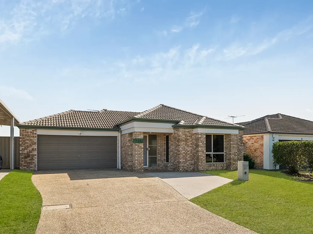 Spacious Four Bedroom Home with Multiple Living Areas!