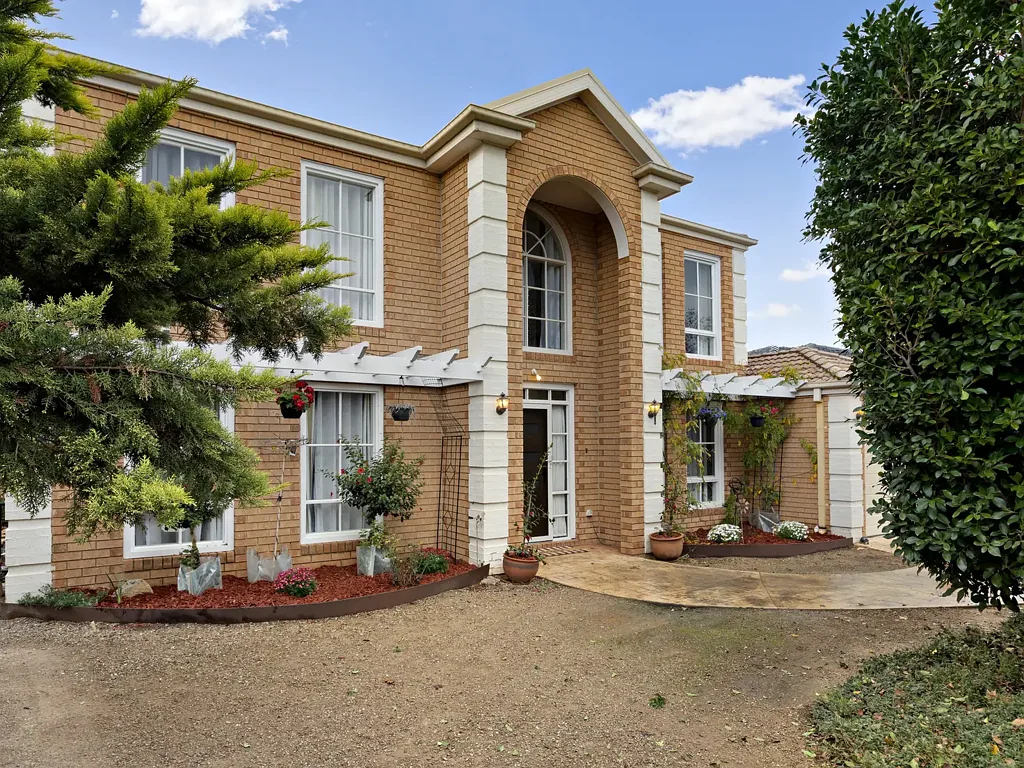 Hillside 4 Bedroom Spacious Family Living with Modern Renovations on 676m² in a Premier Hillside Pocket