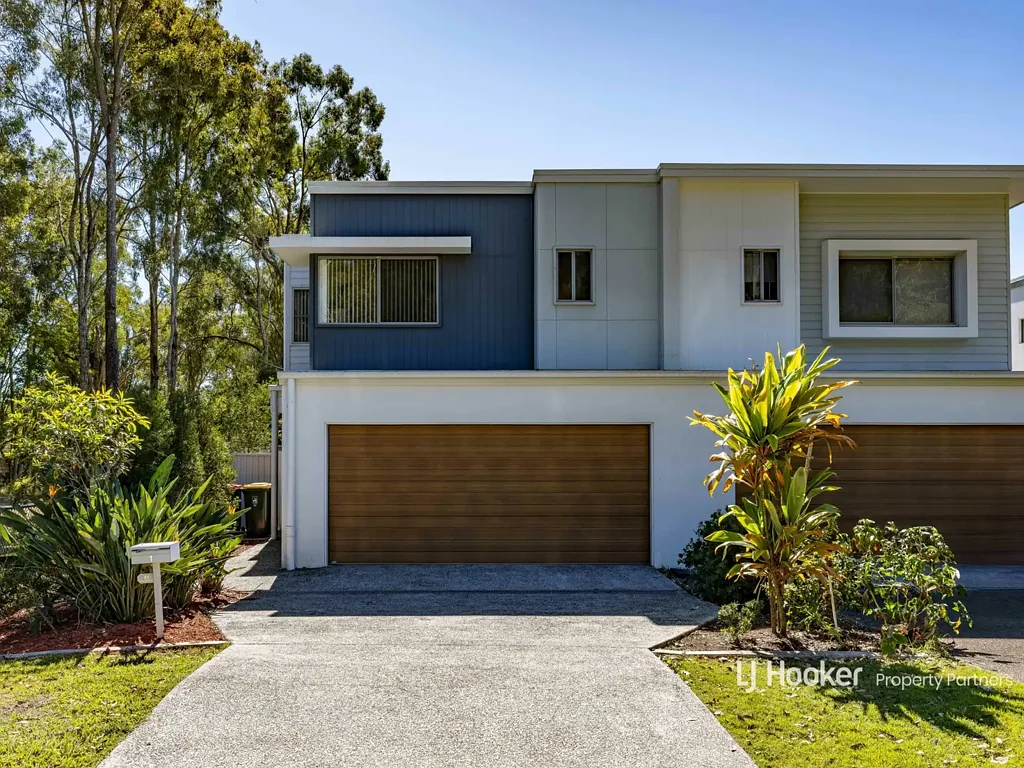 Spacious and modern townhouse nestled amongst the trees!!