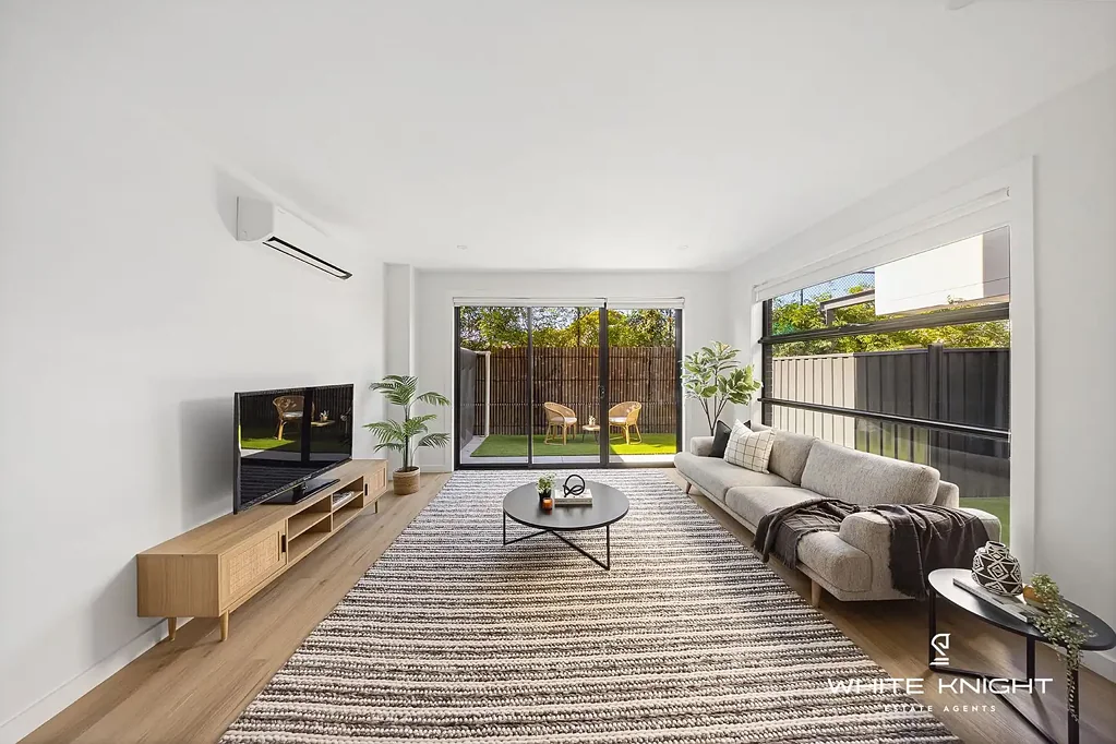 Spacious 4-Bedroom Townhouse with Carport in Prime Location