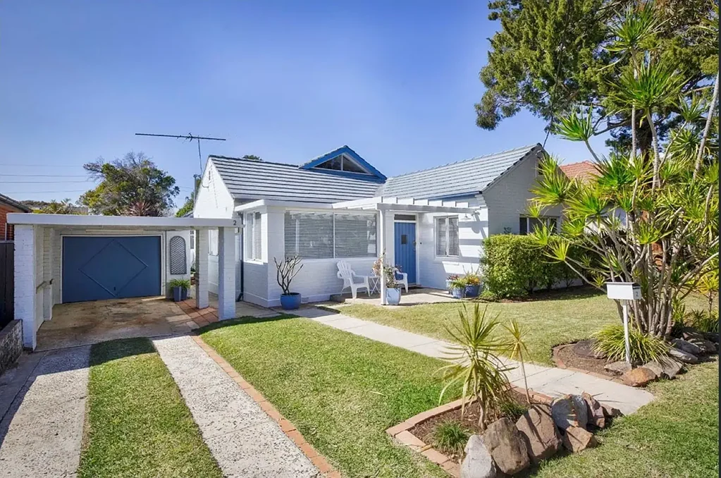 Superb Single Level Living in Ultimate Beachside Location