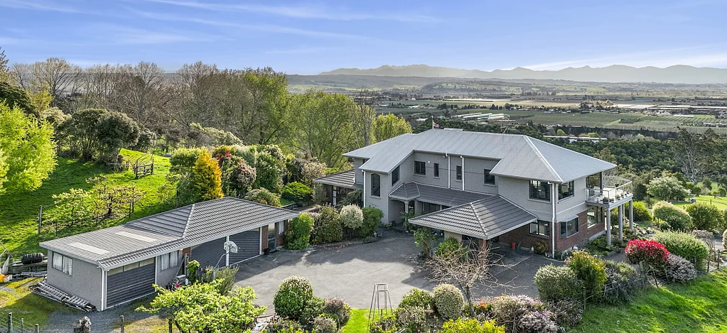 Hope Two homes under one roof with land and views