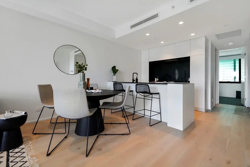 BEAUTIFULLY APPOINTED NORTH FACING APARTMENT WITH PARKING
