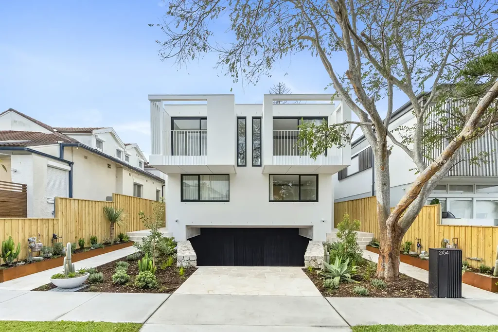 Brand New, North Facing Semi with a Large Lock Up Garage!