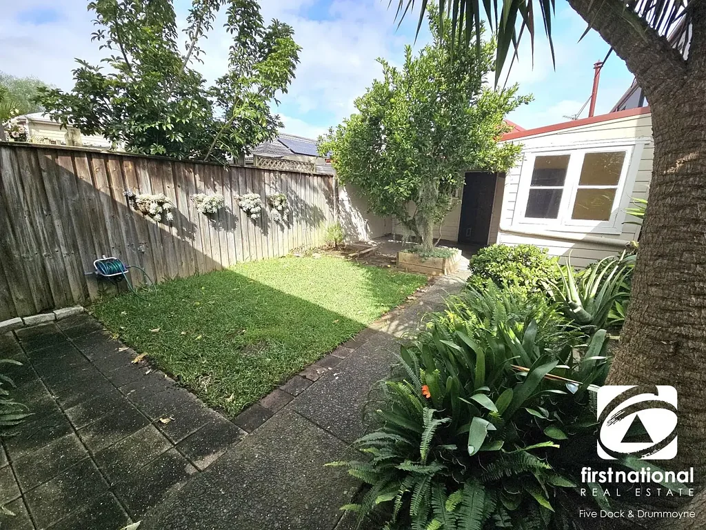 Charming Freestanding Home with Sunny Garden and Dual Street Access