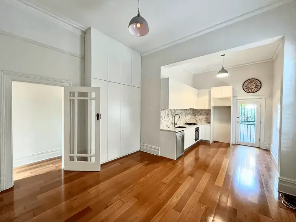 Sunlit Semi-Style Apartment with Private Courtyard & Parking!