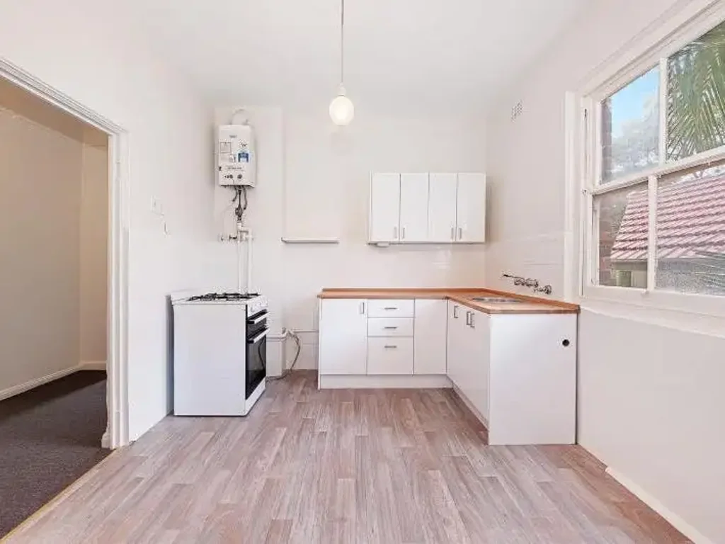 OVERSIZED TWO BEDROOM PLUS SUNROOM/STUDY!