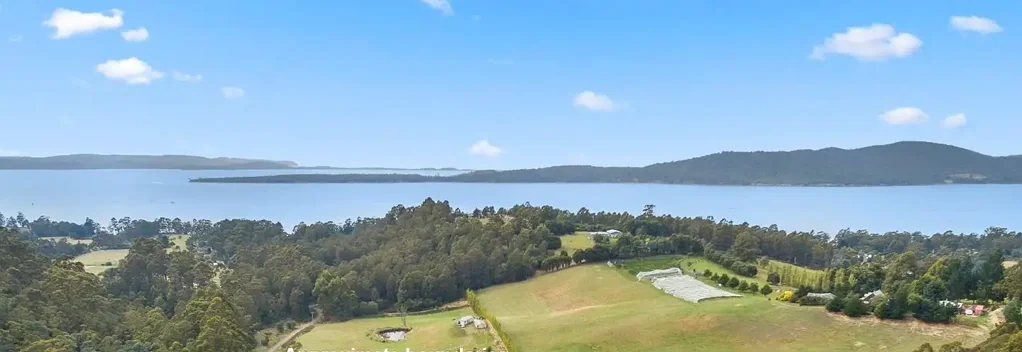 Gordon 4 Bedroom Fruit Orchard, Vineyard, Winery, Distillery, Timber and Cattle with four-bedroom House. Ocean view in two directions.
