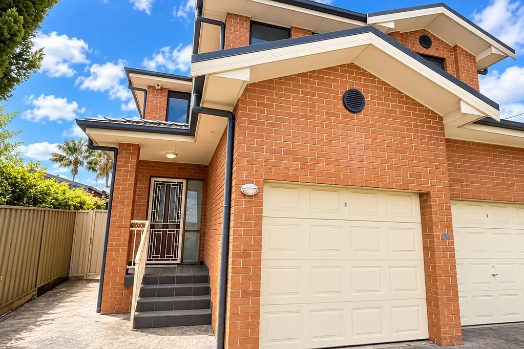 Modern three-bedroom three-bathroom duplex with multiple living areas