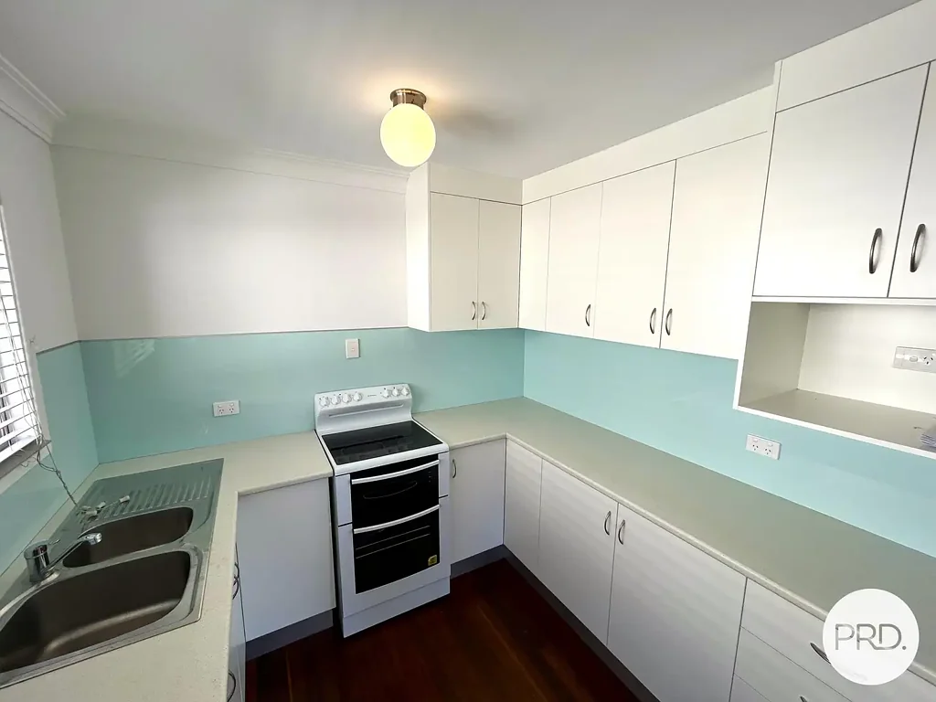 CLOSE TO THE BEACH WITH LARGE YARD & PLENTY OF STORAGE