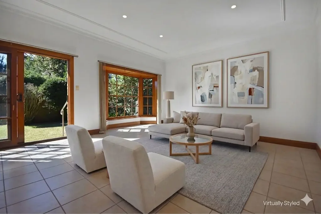 GRAND CHARACTER FILLED HOME WITH DOUBLE GARAGING & BACKYARD