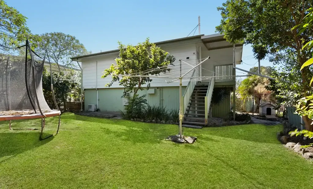 Charming High-Set Home with Huge Backyard in a Convenient Location