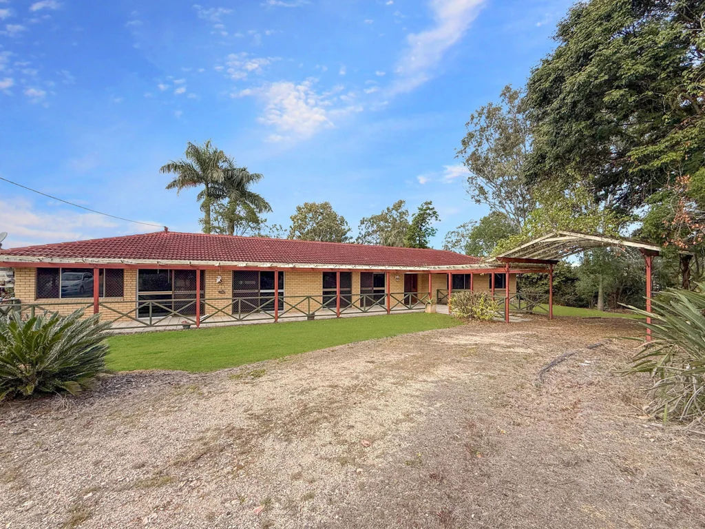 HOUSE AND HUGE SHED WITH LOADING RAMP