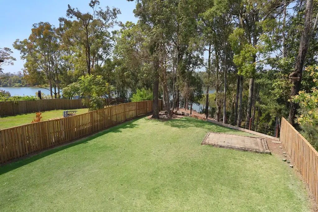 RIVERSIDE LIVING IN THIS SPACIOUS HOME WITH SOLAR POWER & EV CHARGER