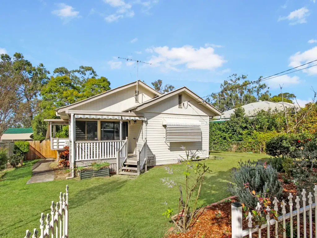 4 Bedroom Home with New Carpet and Paint plus a Shed.