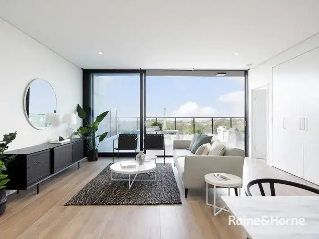 MODERN TWO BEDROOM PENTHOUSE WITH DISTRICT VIEW & TWO PARKING SPACES!